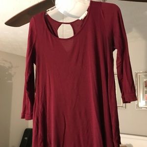 Burgundy shirt. Flowy fit with a key hole back